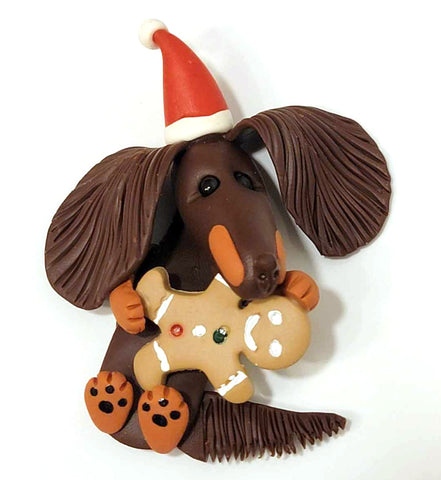 Chocolate/Tan Long with Gingerman in Santa Hat Handmade Dachshund Figurine Magnet